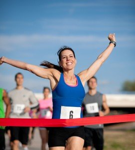 iStock_000019421703Lg-Woman-Athlete_Finish-Line-271x300